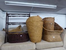 ALI-BABA WICKER LINEN BASKET; WOODEN TOWEL HORSE; A RUSTIC WOODEN THREE LEGGED STOOL AND AN OVAL