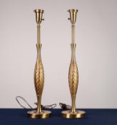 PAIR OF TWENTIETH CENTURY AMERICA GILT METAL ELECTRIC TABLE LAMPS, each of slender ovoid form with