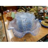 QUANTITY OF COLOURED GLASSWARES TO INCLUDE; THREE CARNIVAL GLASS RUFFLED BOWLS, A BLUE GLASS DESSERT