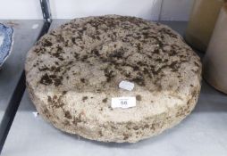 A MILLSTONE (14" DIAMETER)