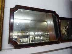 AN OBLONG BEVELLED EDGE WALL MIRROR WITH INCUSED CORNERS IN MAHOGANY FRAME