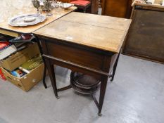 AN OAK DRINKS TABLE, THE CENTRE OPENING TOP REVEALING AN AUTOMATICALLY RISING INTERIOR, ON SQUARE