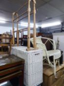 A WHITE WICKER TUB CHAIR; A PINE TOWEL HORSE AND A WHITE CANE OBLONG LINEN BASKET (3)