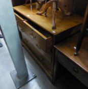 AN EDWARDIAN CROSSBANDED MAHOGANY CHEST OF TWO SHORT AND TWO LONG DRAWERS