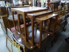 A G-PLAN TEAK NEST OF THREE COFFEE TABLES