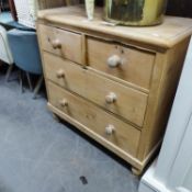 VICTORIAN PINE CHEST OF TWO SHORT AND TWO LONG DRAWERS, ON TOUPE FEET