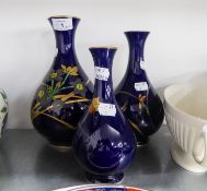 A MODERN JAPANESE PORCELAIN OVULAR VASE AND DOMED COVER WITH FINIAL AND TWO GINGER JARS AND