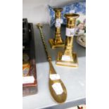 PAIR OF BRASS CANDLESTICKS AND A BRASS SHOEHORN WITH LONG HANDLE