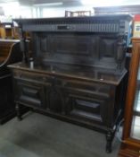 A CARVED OAK DRESSER SIDEBOARD OF JACOBEAN STYLE WITH HIGH CANOPY BACK, TWO DRAWERS OVER TWO