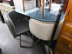 A KITCHEN DINING TABLE WITH TWO TONE GLASS TOP, ON FOUR STAINLESS STEEL SQUARE LEGS AND THE FOUR