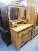 AN EDWARDIAN BIRCHWOOD SINGLE WARDROBE AND DRESSING TABLE, ALSO A BEECHWOOD ROCKING CHAIR AND A PAIR