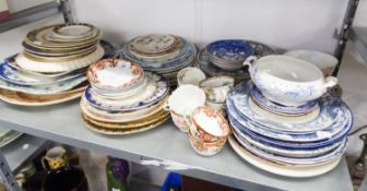 FOUR LARGE CERAMIC MEAT PLATES AND A LARGE QUANTITY OF PLATES TO INCLUDE; BLUE AND WHITE WARES,