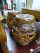 A PAIR OF MODERN INDONESIAN TEAK DRUM-SHAPE CARVED STANDS/STOOLS, 17 1/2" (44.5cm) high (2)