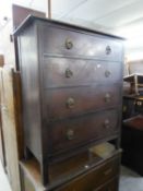 A PRE-WAR OAK CHEST OF FOUR LONG DRAWERS WITH METAL RING HANDLES