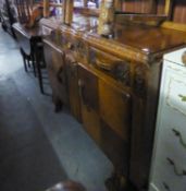 1950's VINE CARVED OAK SIDEBOARD, THREE DRAWERS OVER TWO CUPBOARDS, ON CARVED PANEL FRONT SUPPORTS