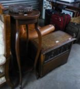 A SMALL OAK CHEST WITH SHALLOW DOMED TOP AND CARVED FRONTAL PANEL, ALSO AN EDWARDIAN PLANT STAND  (