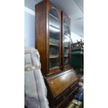 A MAHOGANY BUREAU BOOKCASE, THE VICTORIAN SUPERSTRUCTURE BOOKCASE ENCLOSED BY TWO GLAZED DOORS,