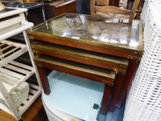 A VINTAGE SET OF THREE MAHOGANY OBLONG COFFEE TABLES, THE GLAZED TOPS HAVING ANTIQUE MAP
