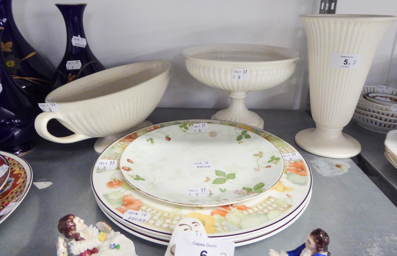 THREE WEDGWOOD LOBED WHITE POTTERY PIECES, VIZ A TRUMPET VASE, A BOAT SHAPED BOWL AND A CIRCULAR