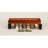 SET OF EBONY AND BONE DOMINOES, in slide top blonde wood box, split to top