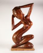 MODERN SOUTH EAST ASIAN CARVED wooden naked female figure on a later softwood plinth 31 1/2" (80)