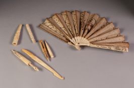 LATE 18th CENTURY EUROPEAN CARVED AND PIERCED IVORY BRISE FAN later applied with paper leaf sequin ,