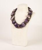 20th CENTURY GLASS BEAD NECKLACE mounted with thirteen natural amethyst stones
