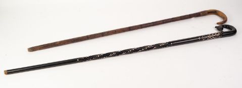 CIRCA 1920s AFRICAN CARVED EBONY AND IVORY INLAID WALKING STICK, the loop handle carved in the