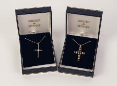 A BROOKS AND  BENTLEY 9ct GOLD DARK BLUE STONE AND MINUTE WHITE STONE SET CRUCIFIX on 9ct gold