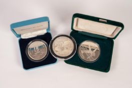 AMERICAN SILVER DOLLAR, 2003, together with AN ELIZABETH II CALGARY OLYMPICS SILVER 20 DOLLAR