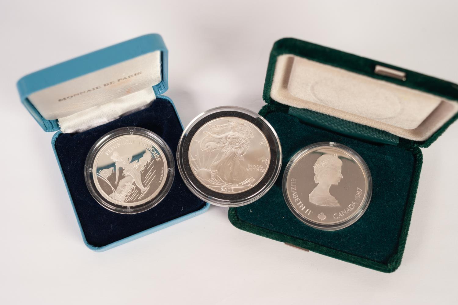 AMERICAN SILVER DOLLAR, 2003, together with AN ELIZABETH II CALGARY OLYMPICS SILVER 20 DOLLAR - Image 2 of 2