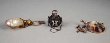 SMALL 19th CENTURY CARVED EBONY GLOBULAR SCENT BOTTLE with silver coloured metal hinge lid and