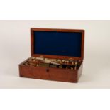 MID NINETEENTH CENTURY BRASS DRUM MICROSCOPE, in a fitted mahogany case with accessories and set