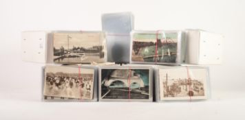 IN EXCESS OF NINE HUNDRED EARLY TWENTIETH CENTURY AND LATER POSTCARDS IN INDIVIDUAL PLASTIC SLEEVES,