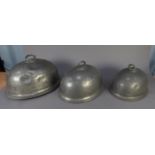 GRADUATED SET OF THREE ELECTROPLATED BASE METAL MEAT DOMES BY JAMES DIXON & SONS, each of oval