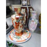 A JAPANESE SATSUMA POTTERY VASE PAINTED AUTOUR WITH FIGURES AND ANOTHER ORIENTAL VASE AND A JAPANESE