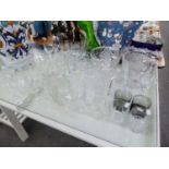 A GOOD SELECTION OF CUT AND MOULDED GLASSWARES TO INCLUDE; DECANTERS, STEM WINE GLASSES, TUMBLERS