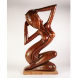 MODERN SOUTH EAST ASIAN CARVED wooden naked female figure on a later softwood plinth 31 1/2" (80)