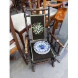 AN EARLY TWENTIETH CENTURY STAINED BEECHWOOD CHILDS ROCKING CHAIR, ALSO FOUR WEDGWOOD POTTERY RACK