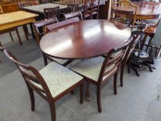 GOOD QUALITY MAHOGANY OVAL DINING TABLE ON FOUR SPUR BASE AND A SET OF SIX DINING CHAIRS ON TAPERING