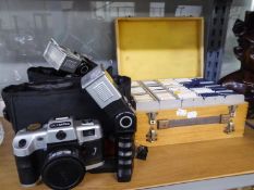 TWO OLYMPIA CAMERA'S WITH FLASH UNITS  IN CASE, AND A BOX OF SLIDES (3)