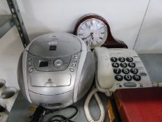 A PORTABLE RADIO AND CD PLAYER AND A WM WIDDOP QUARTZ MANTEL CLOCK AND A LARGE NUMBER TELEPHONE (3)