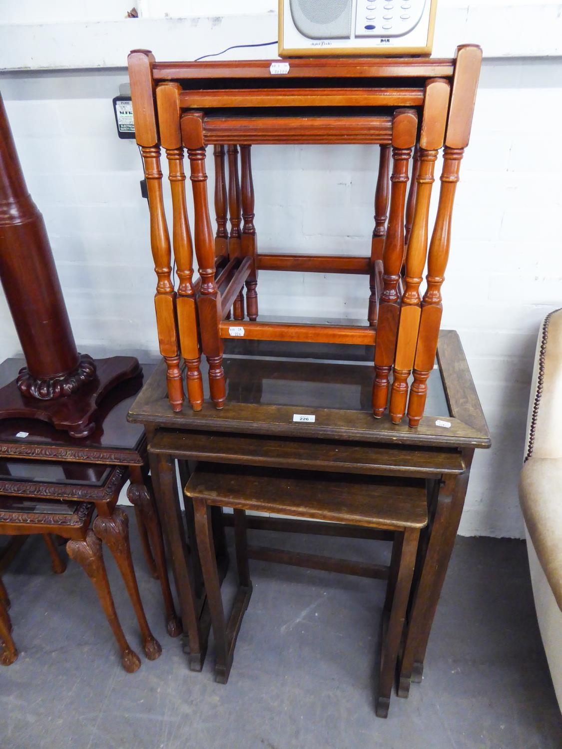 A NEST OF THREE GERMAN OAK TABLES, THE LARGEST HAVING GLASS INSET TOP, ALSO ANOTHER NEST OF THREE