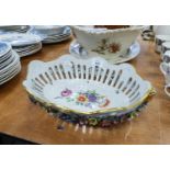 MODERN GERMAN FLORAL ENCRUSTED AND PIERCED PORCELAIN OVAL BASKET, with hand painted floral centre,