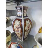 A LARGE ORIENTAL PORCELAIN HEXAGONAL VASE, PAINTED WITH EXOTIC BIRDS, 41cm high