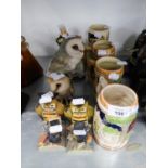 FOUR CONTINENTAL POTTERY EMBOSSED STEINS; FOUR VARIOUS PLATES; FOUR RESIN OWL ORNAMENTS AND A