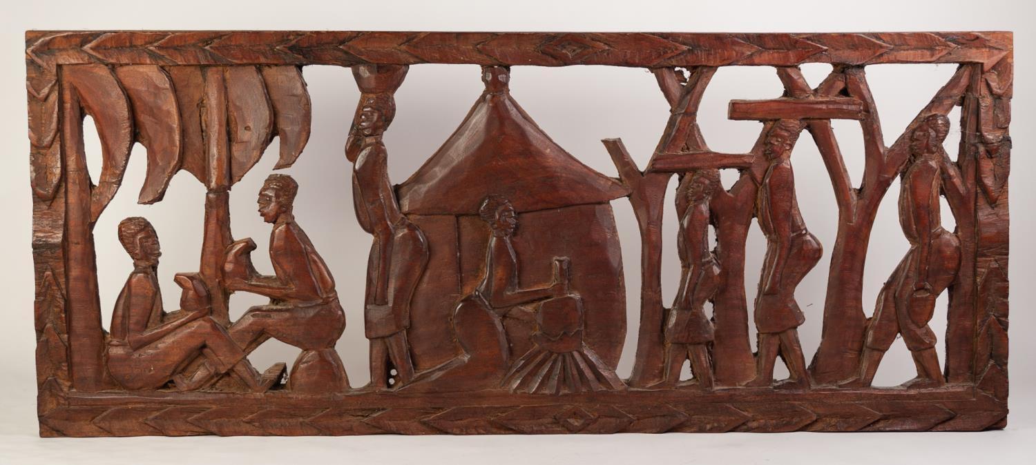 AFRICAN CARVED OPENWORK WALL MOUNTED APPLIQUE OF NATIVE FIGURES AT WORK includes female in hut