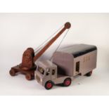 CIRCA 1950s/60s PAINTED WOOD MODEL OF AN ARTICULATED LORRY AND TWO WHEEL TRAILER, with simple peg