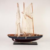 *MODERN PAINTED AND STAINED WOOD DISPLAY MODEL OF A THREE-MASTED OCEAN GOING YACHT OR CLIPPER SHIP