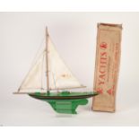 LINES BROS LTD., LONDON, VINTAGE POND YACHT, the 12in (30.4cm) metal hull green and black enamelled,